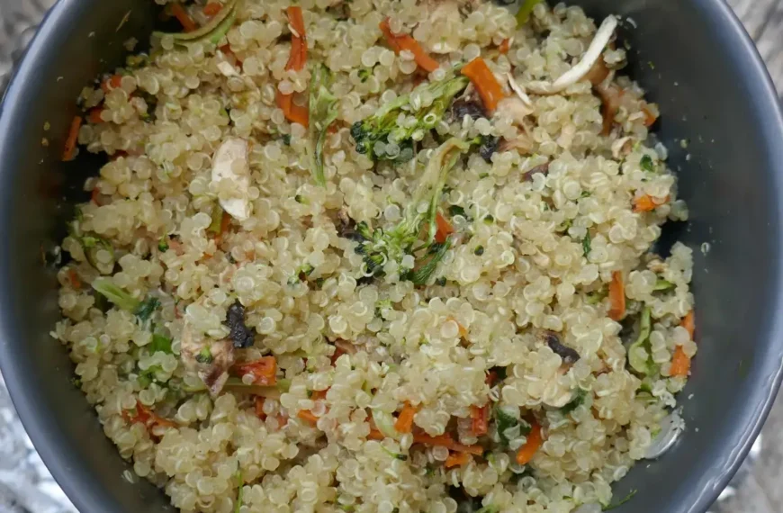 A quinoa and veggie medley sits in a pot.