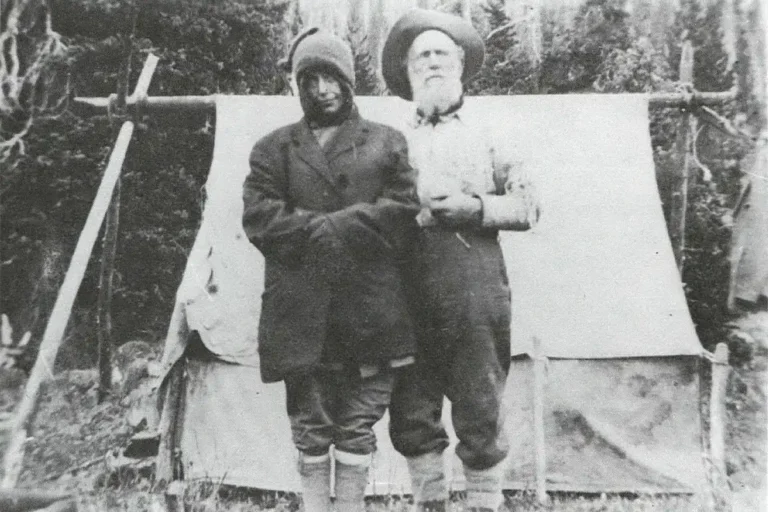 Mary Warburton and Podunk Davis pose for a photo after her rescue in 1926.