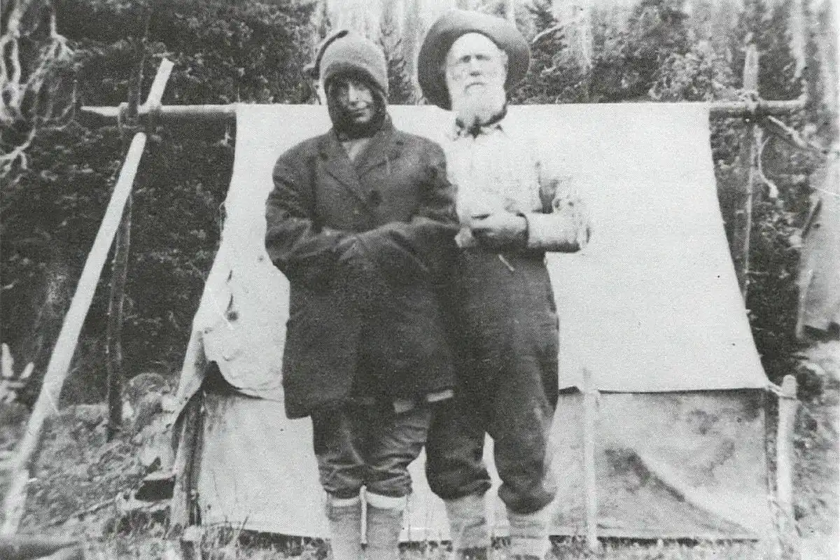 Mary Warburton and Podunk Davis pose for a photo after her rescue in 1926.