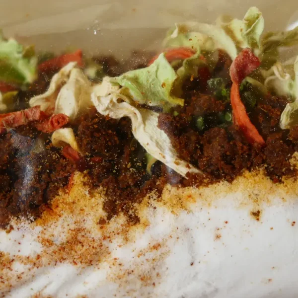 Dehydrated curry soup in a plastic bag.