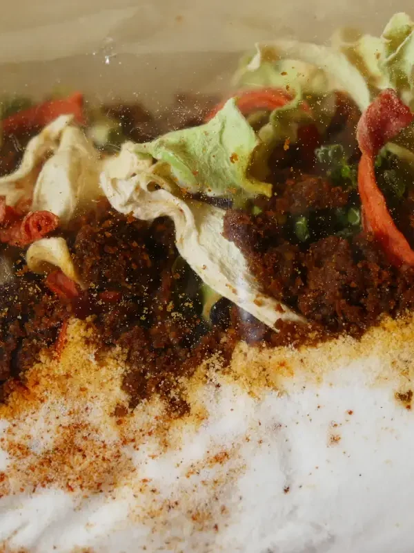 Dehydrated curry soup in a plastic bag.