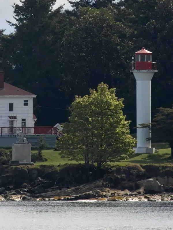 Active Pass Lighthouse on Mayne Island, as seen from the water