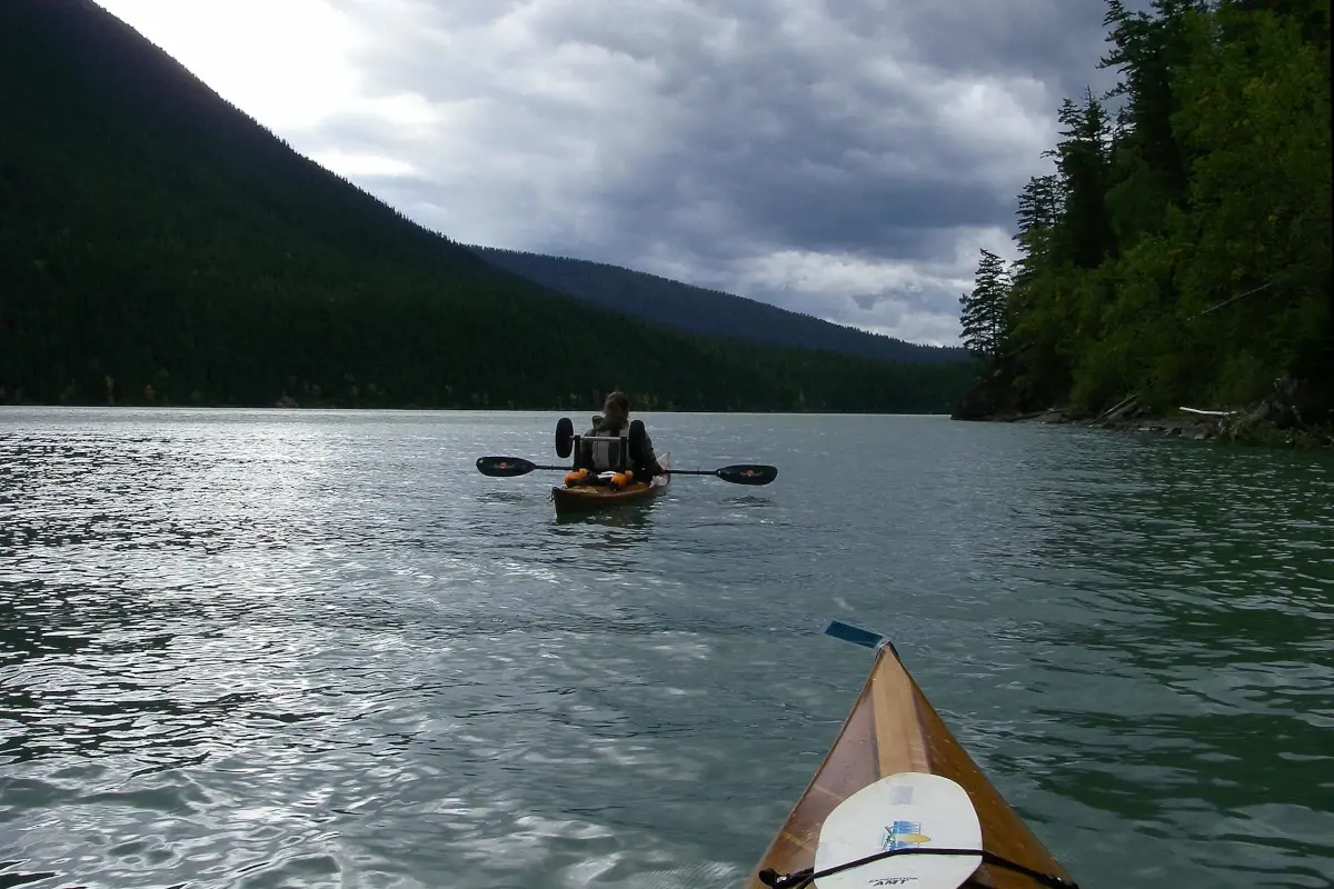 Two paddlers make their way on the Bowron Lake Circuit.