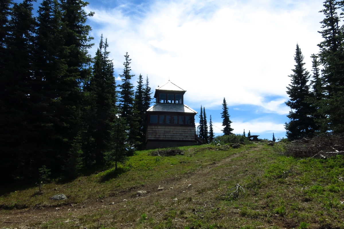 Windy Joe fire lookout perched on a hill in Manning Park, BC.